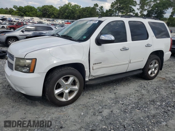 2011 Chevrolet Tahoe LS with VIN 1GNSCAE08BR394917, listed as a Copart auction lot 60470395 with 143,824 mi miles and Salvage title. Bid and sale history available at DreamBid. Image 1.