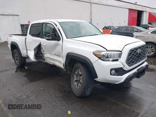2021 Toyota Tacoma 4WD SR5 with VIN 3TMDZ5BN6MM108851, listed as a IAAI auction lot 41513057 with 25,261 mi miles. Bid and sale history available at carsss.com. Image 1.
