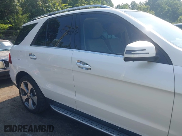 2016 Mercedes-Benz GLE 350 z VIN 4JGDA5JB9GA763209, wystawiony jako IAAI lot #42605541 z przebiegiem 75 461 mil mil oraz . Historia ofert i sprzedaży dostępna na DreamBid. Obrazek 13.