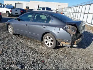 2009 Nissan Altima 2.5 with VIN 1N4AL21E99N538882, listed as a IAAI auction lot 42119130 with 154,146 mi miles. Bid and sale history available at carsss.com. Image 3.
