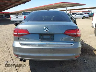 2017 Volkswagen Jetta SEL z VIN 3VWL17AJ6HM407708, wystawiony jako IAAI lot #41848360 z przebiegiem Nie podano mil oraz . Historia ofert i sprzedaży dostępna na DreamBid. Obrazek 16.