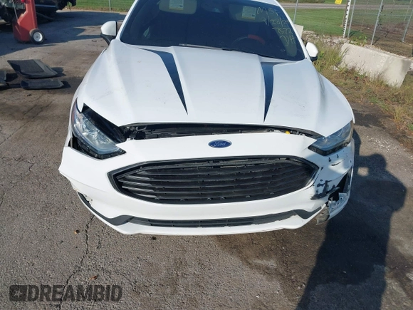 2020 Ford Fusion SE z VIN 3FA6P0T93LR247572, wystawiony jako IAAI lot #40481880 z przebiegiem 59 141 mil mil oraz . Historia ofert i sprzedaży dostępna na DreamBid. Obrazek 6.
