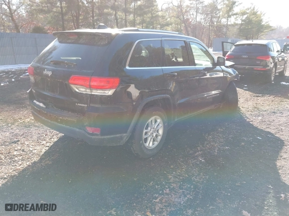 2018 Jeep Grand Cherokee Laredo E with VIN 1C4RJFAG4JC326631, listed as a IAAI auction lot 41191061 with 115,451 mi miles. Bid and sale history available at carsss.com. Image 4.