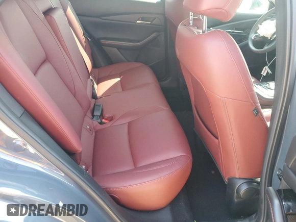 2025 Mazda CX-30 S Carbon Edition z VIN 3MVDMBCM5SM773318, wystawiony jako Copart lot #55027585 z przebiegiem 7 213 mil mil oraz Nie do naprawy • Non repairable. Historia ofert i sprzedaży dostępna na DreamBid. Obrazek 10.