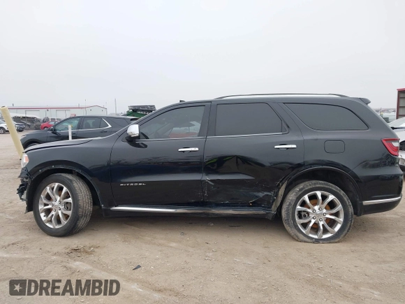 2017 Dodge Durango Citadel with VIN 1C4RDJEG4HC703957, listed as a IAAI auction lot 41163500 with 106,520 mi miles and . Bid and sale history available at carsss.com. Image 14.