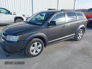 2014 Dodge Journey SE with VIN 3C4PDCAB0ET283756, listed as a IAAI auction lot 41490472 with 122,695 mi miles. Bid and sale history available at carsss.com. Image 18.