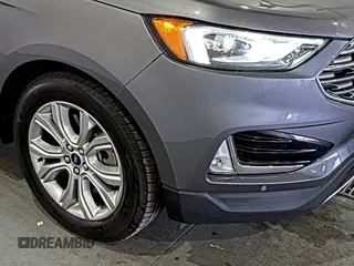 2021 Ford Edge Titanium z VIN 2FMPK3K92MBA53689, wystawiony jako IAAI lot #42501151 z przebiegiem 93 941 mil mil oraz . Historia ofert i sprzedaży dostępna na DreamBid. Obrazek 14.