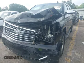 2018 Chevrolet Suburban Premier with VIN 1GNSCJKC9JR100504, listed as a IAAI auction lot 42276280 with 153,916 mi miles and . Bid and sale history available at DreamBid. Image 6.