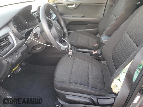 2023 Kia Rio S z VIN 3KPA24ADXPE542764, wystawiony jako Copart lot #49518125 z przebiegiem 73 897 mil mil oraz Szkoda całkowita • Salvage title. Historia ofert i sprzedaży dostępna na DreamBid. Obrazek 7.