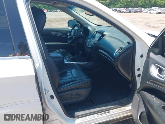 2015 Infiniti QX60 with VIN 5N1AL0MNXFC547099, listed as a IAAI auction lot 42104864 with 128,834 mi miles and . Bid and sale history available at DreamBid. Image 5.