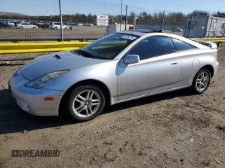 2000 Toyota Celica GT z VIN JTDDR32T1Y0014999, wystawiony jako Copart lot #53584735 z przebiegiem Nie podano mil oraz Czysty tytuł • Clean title. Historia ofert i sprzedaży dostępna na DreamBid. Obrazek 1.