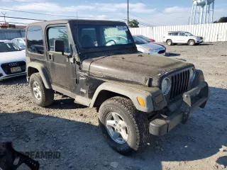 2001 Jeep Wrangler Sport with VIN 1J4FA49SX1P318889, listed as a Copart auction lot 67213064 with 157,444 mi miles and Clean Title. Bid and sale history available at carsss.com. Image 4.