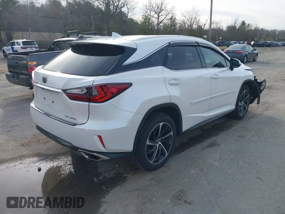 2019 Lexus RX with VIN 2T2BZMCAXKC201239, listed as a IAAI auction lot 41821258 with 78,727 mi miles. Bid and sale history available at carsss.com. Image 4.