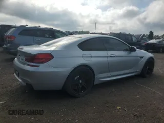 2014 BMW M6 z VIN WBSLX9C53ED160340, wystawiony jako Copart lot #68315924 z przebiegiem 95 899 mil mil oraz Czysty tytuł • Clean title. Historia ofert i sprzedaży dostępna na DreamBid. Obrazek 3.