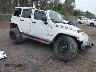 2017 Jeep Wrangler Unlimited Rubicon Recon z VIN 1C4BJWFG1HL577949, wystawiony jako IAAI lot #41364066 z przebiegiem 83 246 mil mil oraz . Historia ofert i sprzedaży dostępna na DreamBid. Obrazek 1.