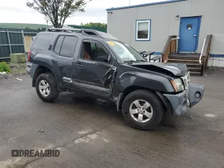 2011 Nissan Xterra S z VIN 5N1AN0NWXBC504569, wystawiony jako Copart lot #57297355 z przebiegiem 151 680 mil mil oraz Szkoda całkowita • Salvage title. Historia ofert i sprzedaży dostępna na DreamBid. Obrazek 4.
