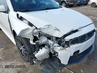 2017 Mitsubishi Lancer ES with VIN JA32V2FW0HU014887, listed as a IAAI auction lot 41056278 with 108,385 mi miles. Bid and sale history available at carsss.com. Image 6.
