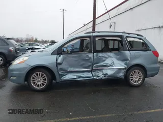 2007 Toyota Sienna XLE z VIN 5TDBK22C97S003525, wystawiony jako IAAI lot #40907947 z przebiegiem Nie podano mil oraz . Historia ofert i sprzedaży dostępna na DreamBid. Obrazek 6.