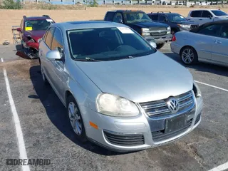2010 Volkswagen Jetta Sedan Limited with VIN 3VWRX7AJ0AM034082, listed as a IAAI auction lot 41423445 with 148,630 mi miles. Bid and sale history available at carsss.com. Image 1.