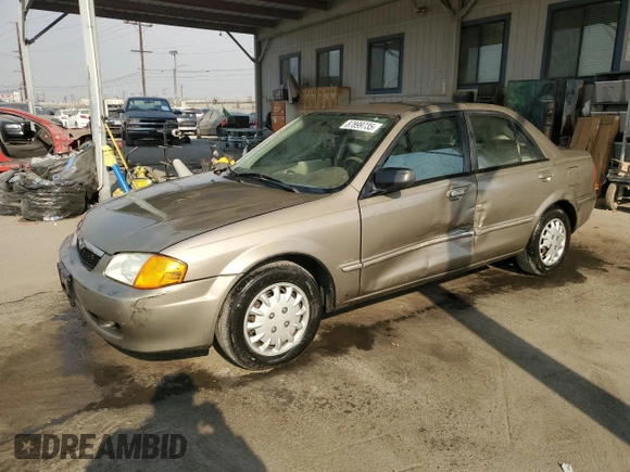 1999 Mazda Protege DX z VIN JM1BJ2223X0137153, wystawiony jako Copart lot #87899735 z przebiegiem 154 209 mil mil oraz Szkoda całkowita • Salvage title. Historia ofert i sprzedaży dostępna na DreamBid. Obrazek 1.