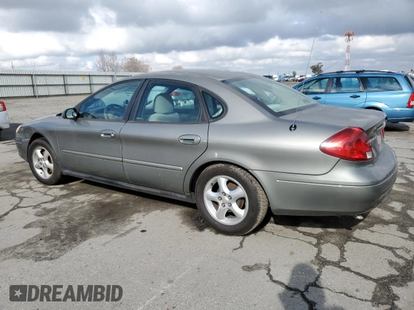 2001 Ford Taurus LX with VIN 1FAFP52U01A131563, listed as a Copart auction lot 89201965 with 79,048 mi miles and Salvage title. Bid and sale history available at DreamBid. Image 2.