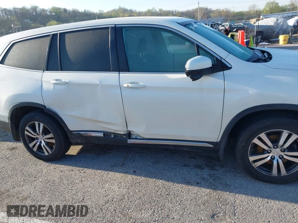 2017 Honda Pilot EX-L with VIN 5FNYF6H54HB015814, listed as a IAAI auction lot 41955743 with 122,389 mi miles and . Bid and sale history available at DreamBid. Image 13.