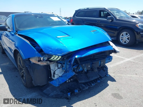2021 Ford Mustang EcoBoost with VIN 1FA6P8TH0M5119073, listed as a IAAI auction lot 42225499 with 52,165 mi miles and . Bid and sale history available at DreamBid. Image 6.