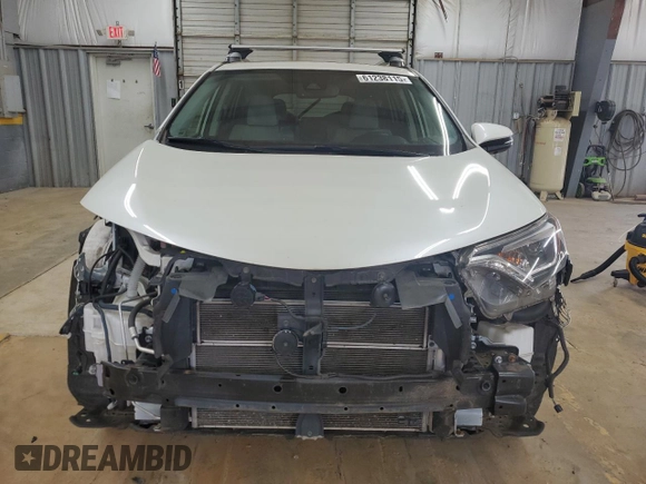 2016 Toyota RAV4 Limited with VIN JTMDJREV9GD014991, listed as a Copart auction lot 61238115 with Not provided miles and Salvage title. Bid and sale history available at DreamBid. Image 5.