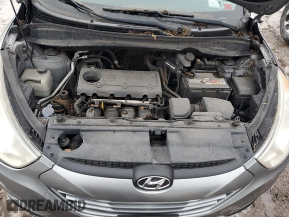 2010 Hyundai Tucson GLS with VIN KM8JU3AC2AU113747, listed as a Copart auction lot 48031375 with 220,982 mi miles and Salvage Title. Bid and sale history available at DreamBid. Image 12.