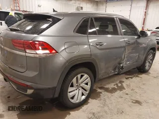 2020 Volkswagen Atlas SE with VIN 1V26E2CA9LC230374, listed as a IAAI auction lot 41336609 with 52,500 mi miles and . Bid and sale history available at DreamBid. Image 4.