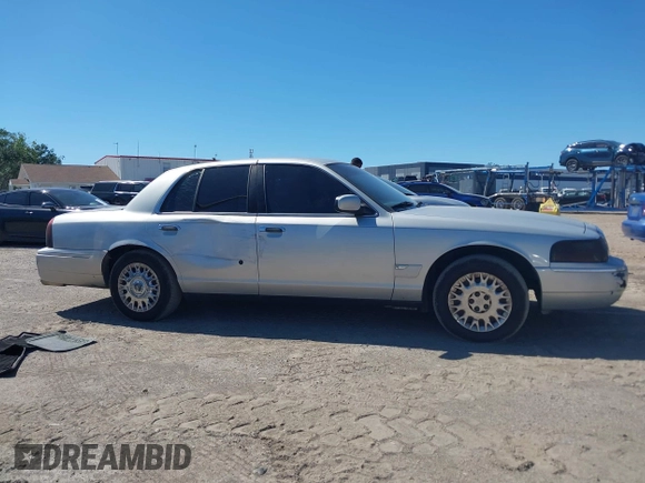 2003 Mercury Grand Marquis GS Convenience with VIN 2MEFM74W63X629935, listed as a IAAI auction lot 42048640 with 114,144 mi miles and . Bid and sale history available at DreamBid. Image 13.