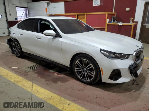 2024 BMW 5 Series 530i xDrive with VIN WBA53FJ01RCS75402, listed as a Copart auction lot 88289285 with 8,802 mi miles and Salvage Title. Bid and sale history available at carsss.com. Image 4.