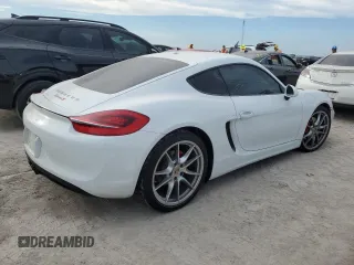 2014 Porsche Cayman S с VIN WP0AB2A84EK191321, выставлен на аукционе Copart как лот 75730564 с пробегом 28 435 миль миль и Списание • Salvage title. История ставок и продаж доступна на DreamBid. Изображение 3.