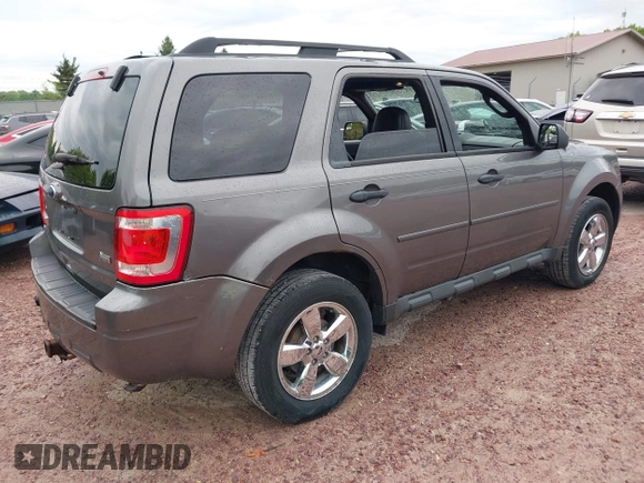 2012 Ford Escape XLT with VIN 1FMCU9DGXCKC23955, listed as a IAAI auction lot 42277339 with 181,738 mi miles and . Bid and sale history available at DreamBid. Image 4.