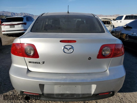 2004 Mazda 3 i with VIN JM1BK12F141168532, listed as a Copart auction lot 43964885 with 266,411 mi miles and Salvage Title. Bid and sale history available at DreamBid. Image 6.