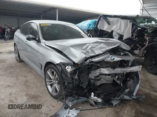 2016 BMW 3 Series GT 328i xDrive with VIN WBA8Z5C59GG501996, listed as a IAAI auction lot 41238964 with 71,542 mi miles. Bid and sale history available at carsss.com. Image 1.