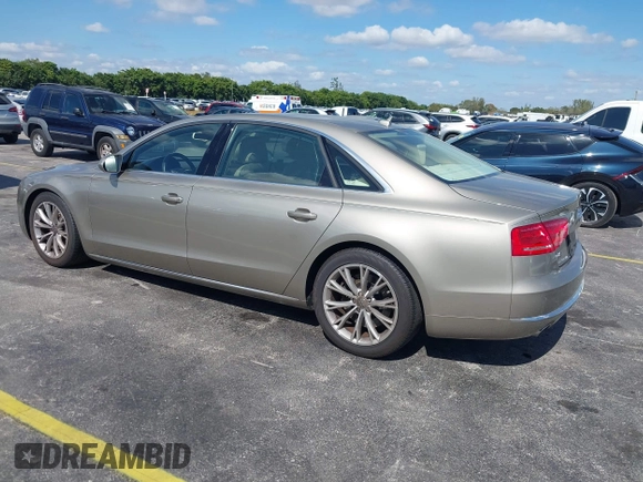 2012 Audi A8 z VIN WAURVAFD0CN001646, wystawiony jako IAAI lot #41524110 z przebiegiem 105 187 mil mil oraz . Historia ofert i sprzedaży dostępna na DreamBid. Obrazek 3.