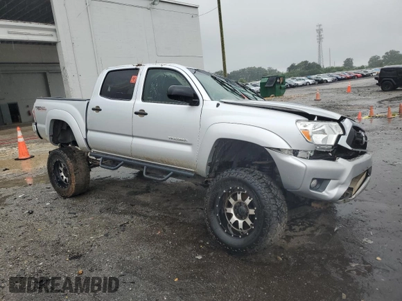 2013 Toyota Tacoma with VIN 5TFLU4EN8DX065656, listed as a Copart auction lot 63486165 with 185,018 mi miles and Salvage title. Bid and sale history available at DreamBid. Image 4.