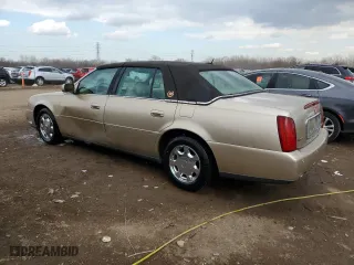 2005 Cadillac DeVille with VIN 1G6KD57Y35U242340, listed as a Copart auction lot 50558795 with 76,856 mi miles and Salvage Title. Bid and sale history available at carsss.com. Image 2.