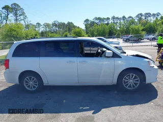 2018 Dodge Grand Caravan SXT with VIN 2C4RDGCG1JR326457, listed as a IAAI auction lot 42047301 with 84,518 mi miles and . Bid and sale history available at DreamBid. Image 13.