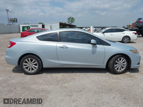 2012 Honda Civic Cpe EX-L with VIN 2HGFG3B12CH532204, listed as a IAAI auction lot 42038754 with 190,675 mi miles. Bid and sale history available at carsss.com. Image 13.