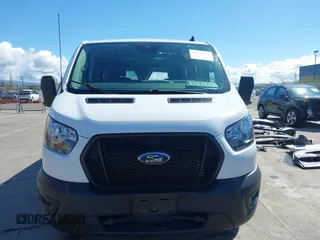 2021 Ford Transit Cargo with VIN 1FTBR2Y80MKA35393, listed as a IAAI auction lot 41732236 with 24,799 mi miles and . Bid and sale history available at DreamBid. Image 12.