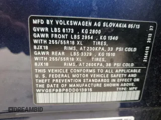 2013 Volkswagen Touareg Exec z VIN WVGEF9BP6DD013915, wystawiony jako Copart lot #55024485 z przebiegiem 238 848 mil mil oraz Szkody całkowita. Historia ofert i sprzedaży dostępna na DreamBid. Obrazek 13.