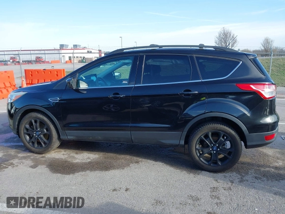 2013 Ford Escape SE with VIN 1FMCU9GX9DUB92246, listed as a IAAI auction lot 41808372 with 73,472 mi miles. Bid and sale history available at carsss.com. Image 14.