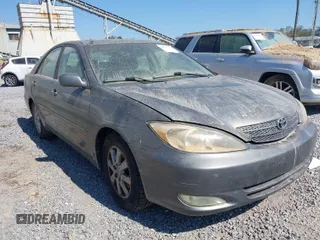 2004 Toyota Camry LE with VIN 4T1BF30K94U576450, listed as a IAAI auction lot 40541915 with 1 mi miles. Bid and sale history available at carsss.com. Image 1.