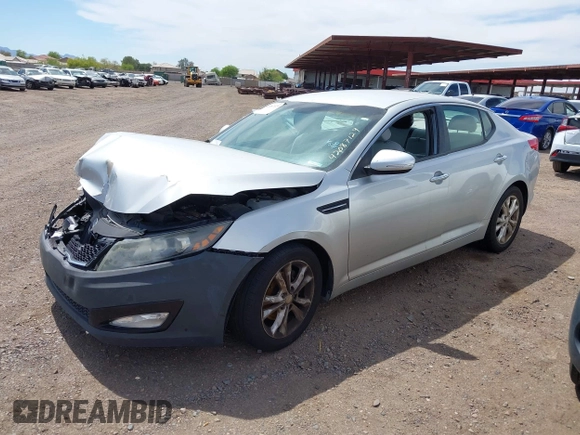 2012 Kia Optima LX with VIN 5XXGM4A7XCG063387, listed as a IAAI auction lot 42087129 with 180,585 mi miles and . Bid and sale history available at carsss.com. Image 2.