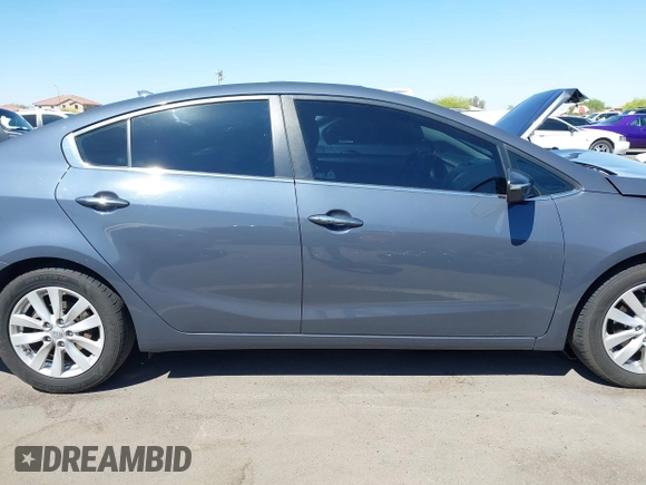 2014 Kia Forte EX with VIN KNAFX4A84E5112910, listed as a IAAI auction lot 42039761 with 118,126 mi miles. Bid and sale history available at carsss.com. Image 14.