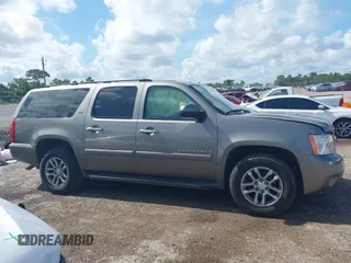 2007 Chevrolet Suburban LS with VIN 1GNFC16J77R260500, listed as a IAAI auction lot 42787990 with 167,163 mi miles and . Bid and sale history available at DreamBid. Image 14.