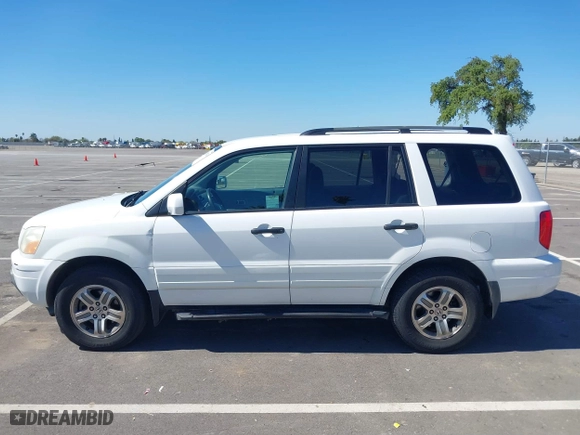 2004 Honda Pilot EX with VIN 2HKYF18424H564482, listed as a IAAI auction lot 41868124 with 173,484 mi miles. Bid and sale history available at carsss.com. Image 14.