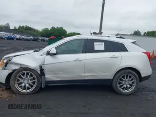 2013 Cadillac SRX Performance Collection with VIN 3GYFNHE34DS628486, listed as a IAAI auction lot 42530124 with 76,778 mi miles and . Bid and sale history available at DreamBid. Image 14.